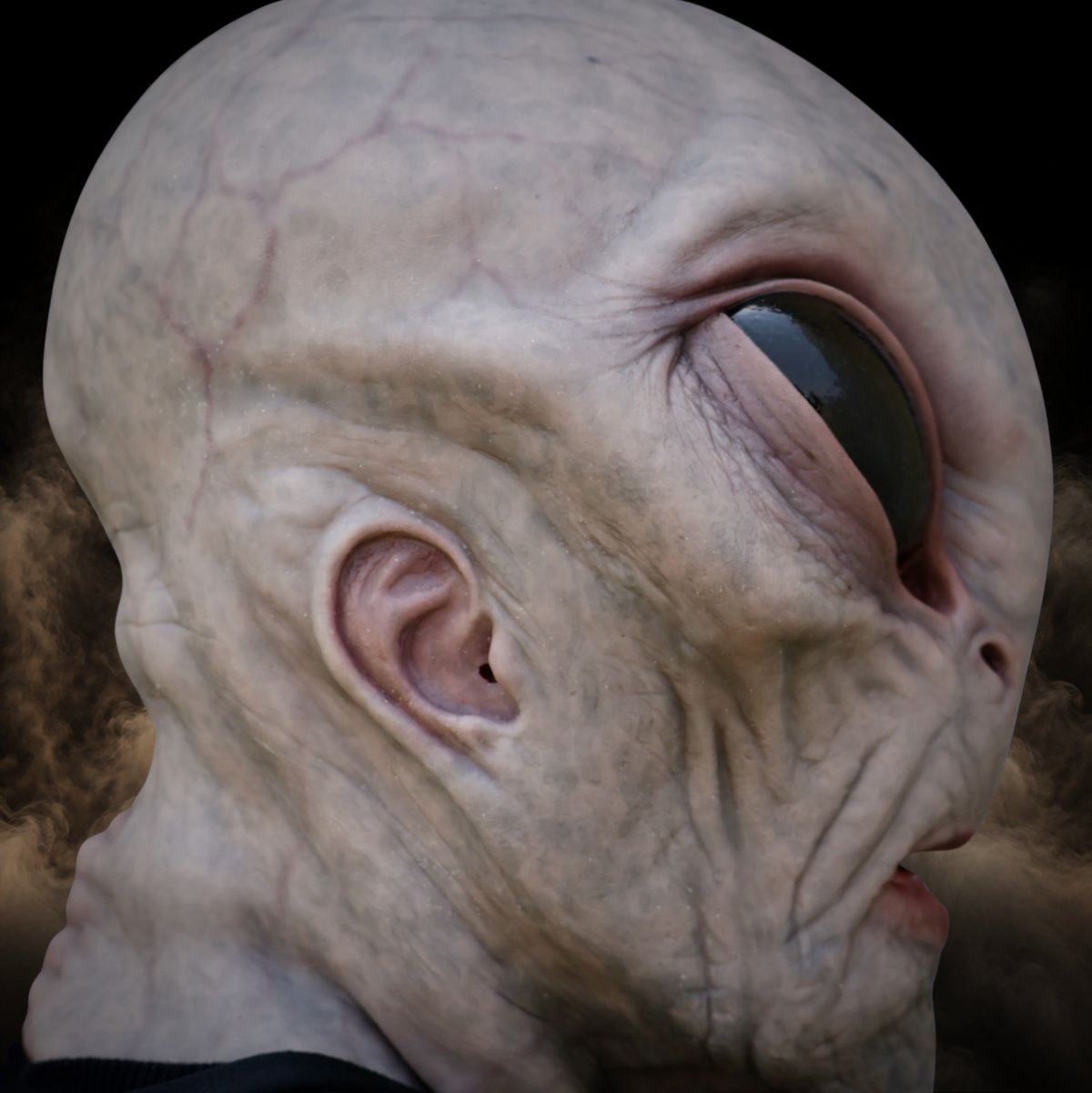 Side view of an alien halloween mask with full head and neck coverage